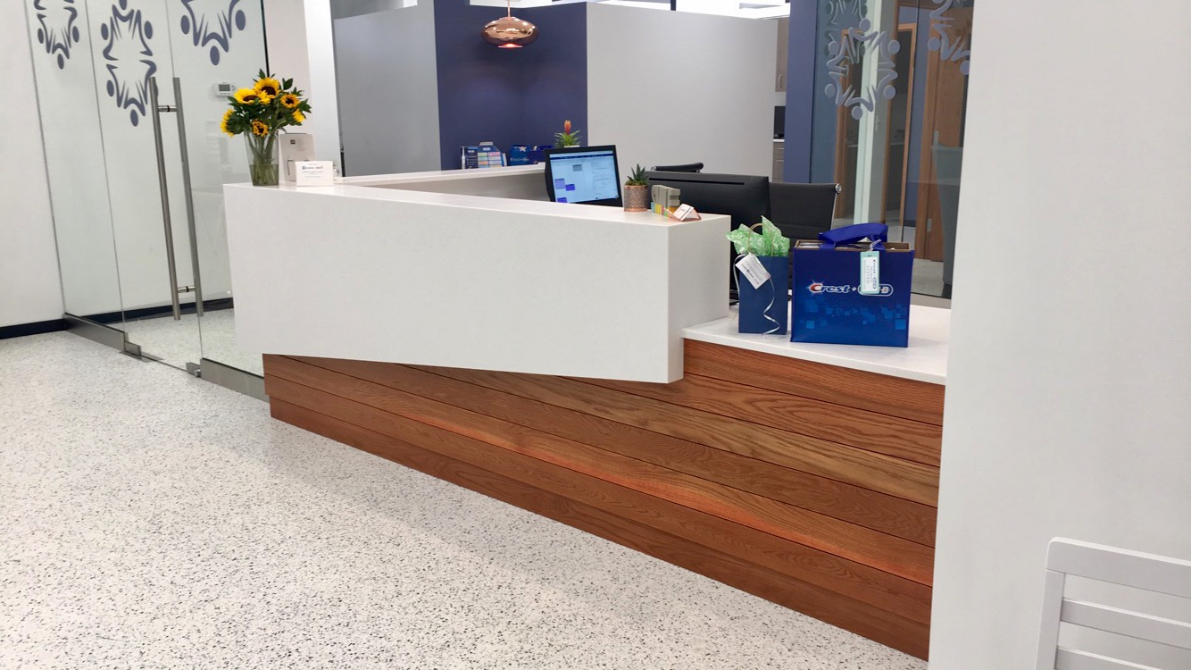medical office reception desk -modern design - mixed materials - design build by A.L. Post Louisville